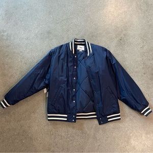 Aritzia TNA Bomber Jacket. Collegiate bomber jacket. Navy blue. New with tags.